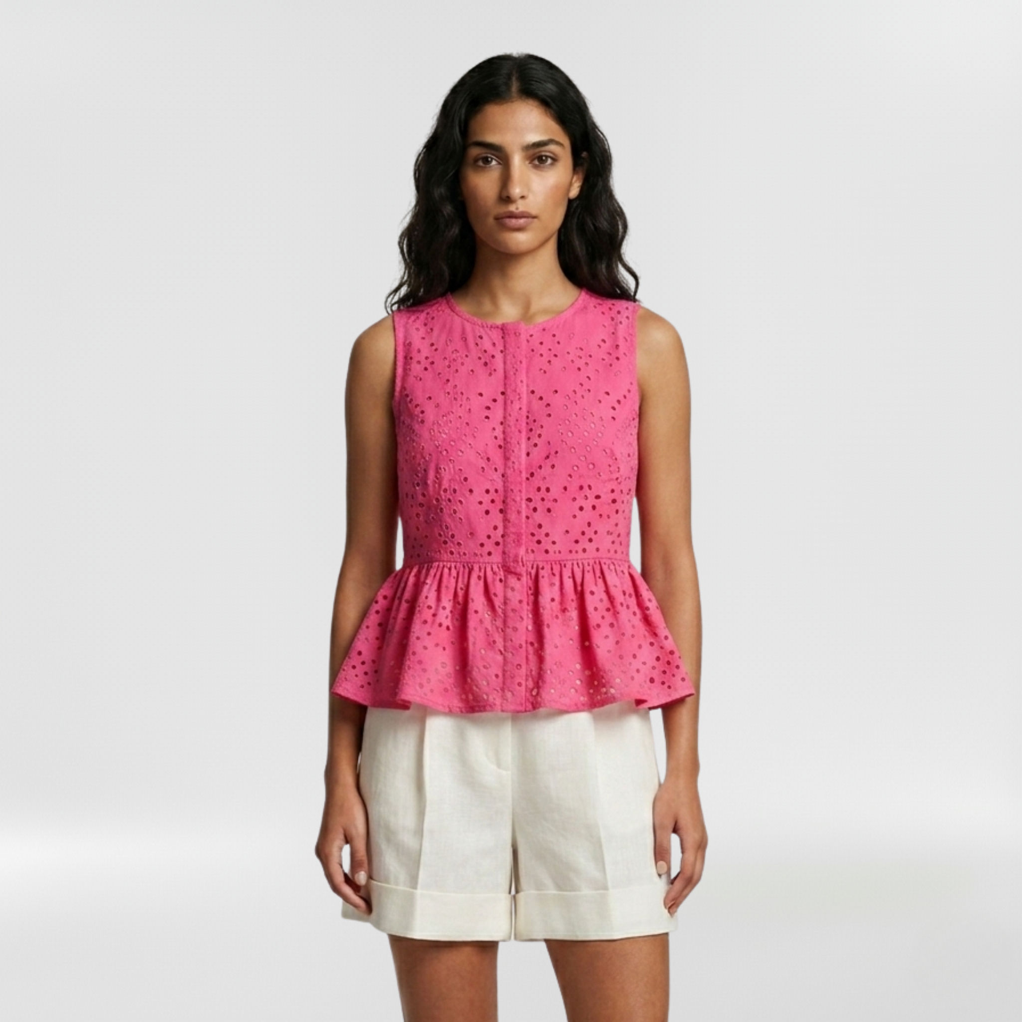 Eyelet Embroidered Peplum Sleeveless Top with Feminine Detailing