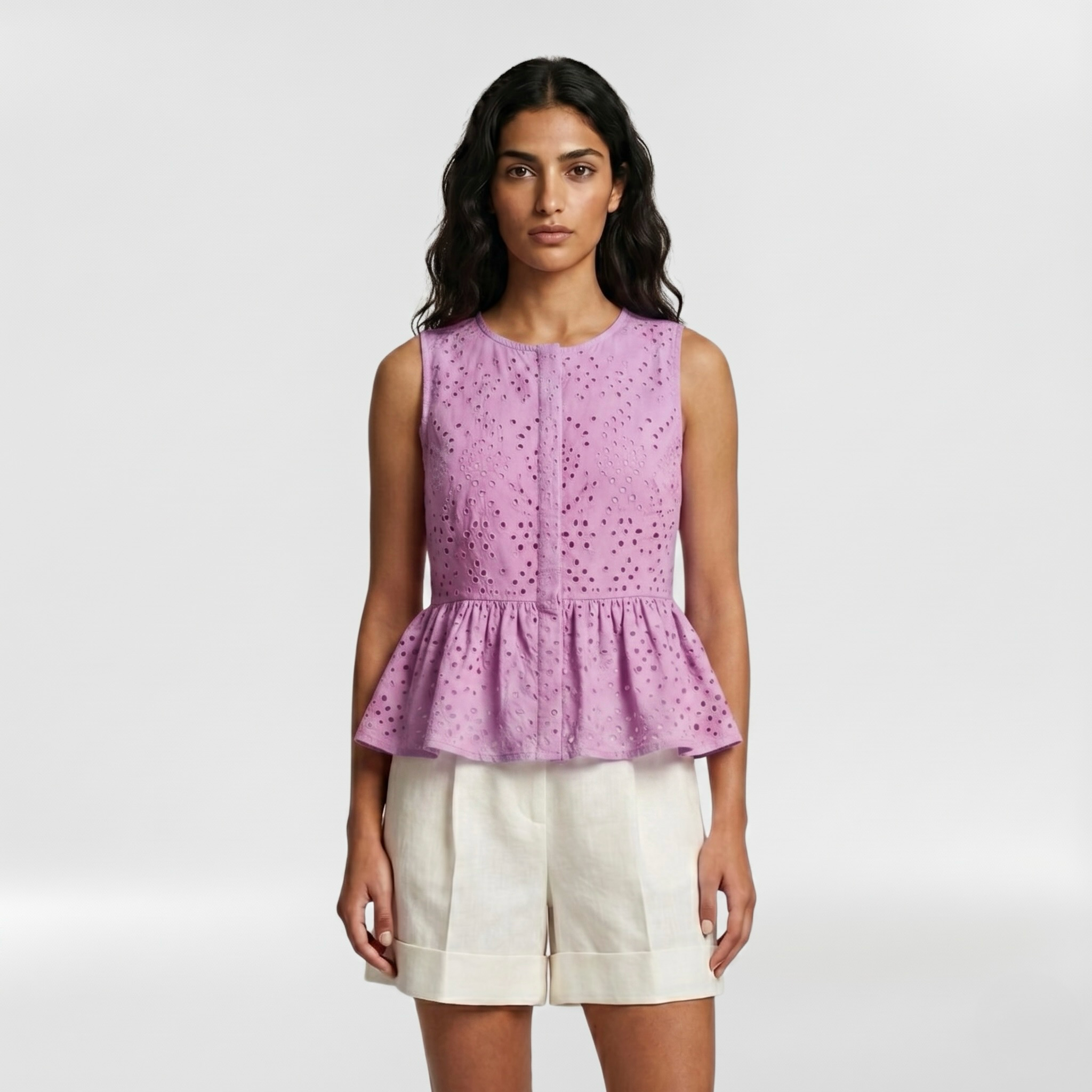 Eyelet Embroidered Peplum Sleeveless Top with Feminine Detailing