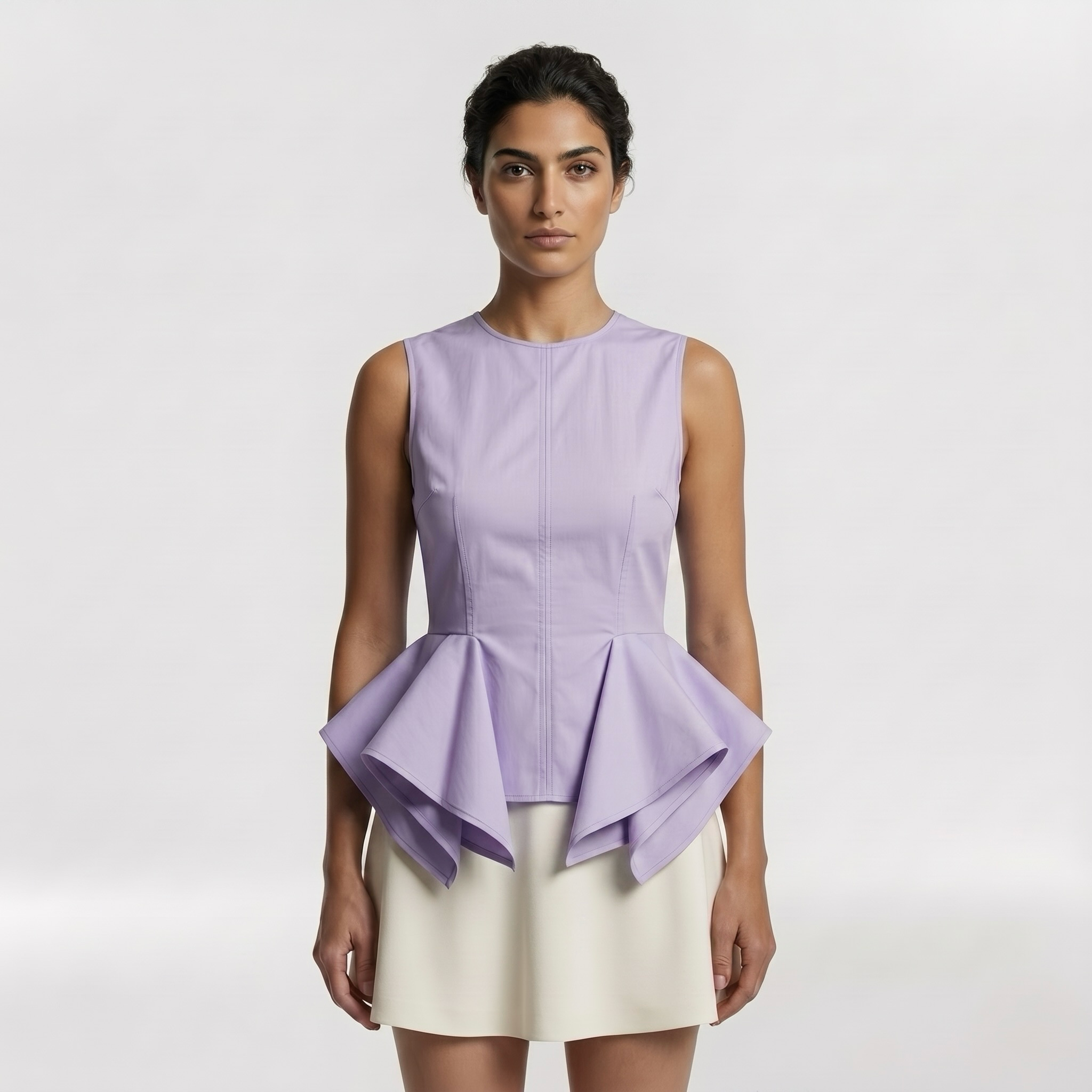 Architectural Peplum Sleeveless Top with Fitted Bodice and Structured Volume