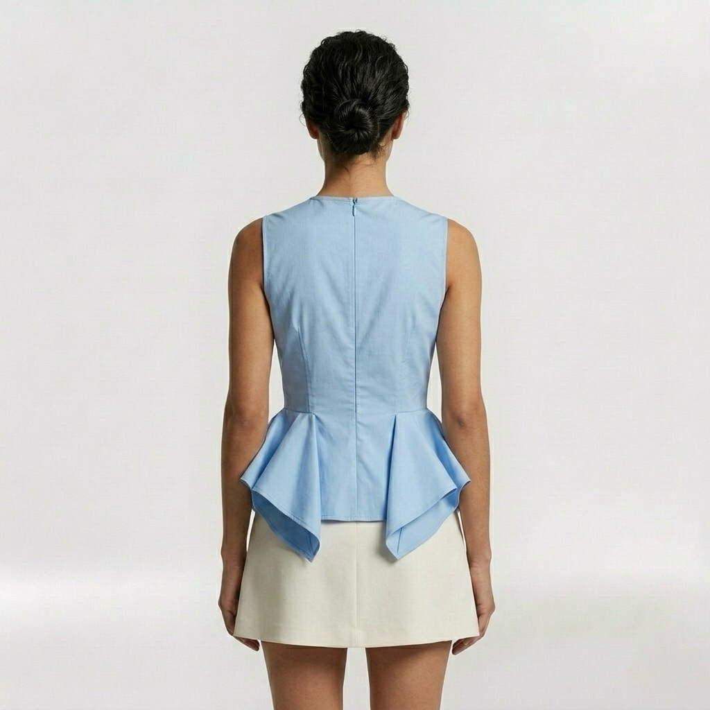 Architectural Peplum Sleeveless Top with Fitted Bodice and Structured Volume