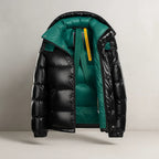 Men's insulated full-zip puffer jacket designed for cold weather, featuring a sleek black exterior, warm filling, and practical zippered pockets for added 2