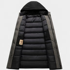 Men's longline hooded parka featuring a thermal lining for added warmth, designed for stylish winter protection. 6
