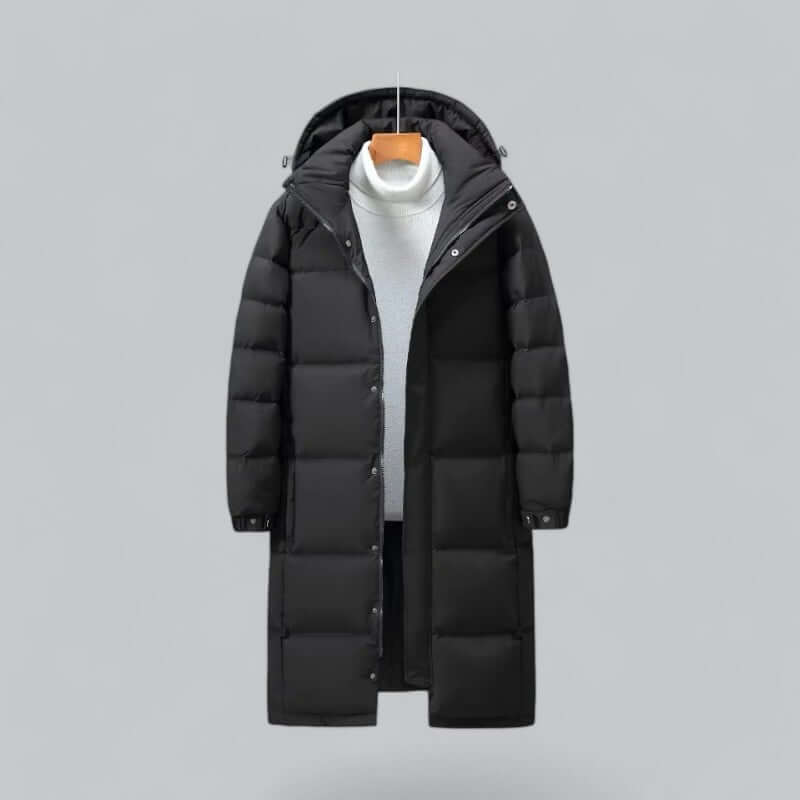 Men's longline quilted winter coat featuring a hood and snap-button cuffs, ideal for warmth and style in cold weather. 1