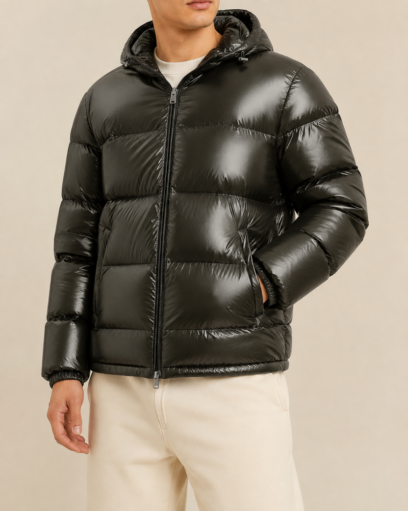 Men's quilted hooded puffer jacket featuring a glossy finish, perfect for winter wear, designed for warmth and style. 1