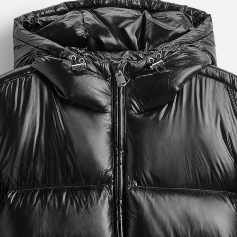 Men's quilted hooded puffer jacket featuring a glossy finish, perfect for winter wear, designed for warmth and style. 3