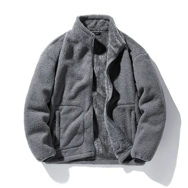 Men's relaxed fit fleece zip-up jacket in navy blue, featuring a cozy design, front pockets, and adjustable cuffs, perfect for casual outings and outdoor 1